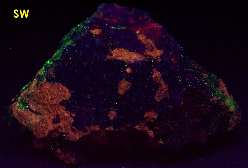 fluorescent FLUORAPATITE, BUSTAMITE, WILLEMITE, ANDRADITE, DIOPSIDE SCHEFFERITE, CALCITE, Franklin Mine, Franklin, Franklin Mining District, Sussex County, New Jersey, USA - type locality