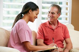 Senior citizen signing up for Featherstone Assisted Living