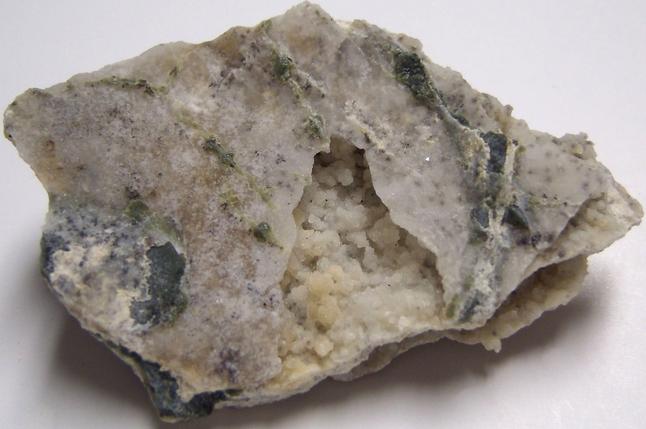 fluorescent CHALCEDONY and MAGNESITE - Bare Hills Serpentine Quarry East, Bare Hills, Baltimore County, Maryland, USA