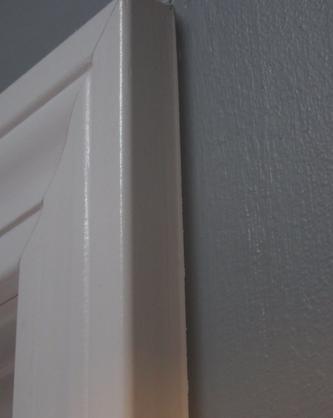 Painted trim with a sharp paint line.