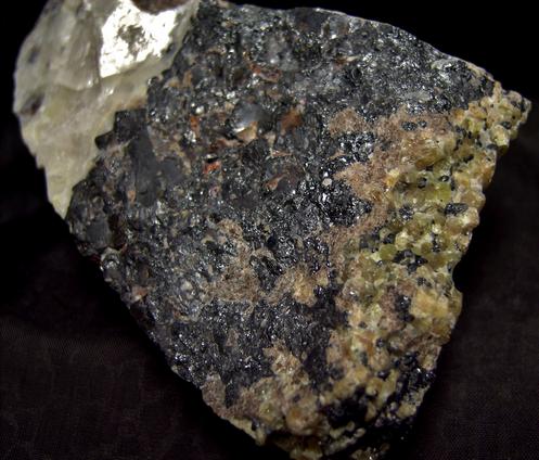 fluorescing CALCITE, WILLEMITE with FRANKLINITE, ZINCITE - Sterling Mine, Sterling Hill, Ogdensburg, Franklin Mining District, Sussex County, New Jersey, USA - type locality