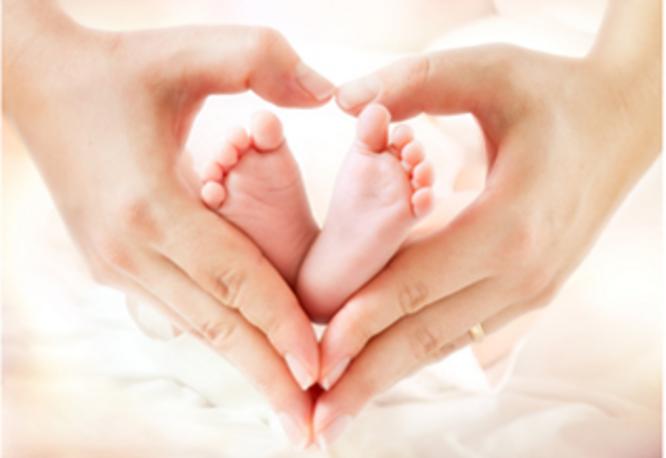Adoption Services Inc- Baby feet in Hands