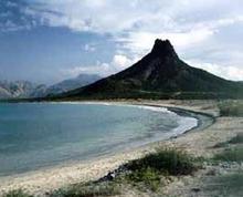 Ocean Beach with Mountains in background