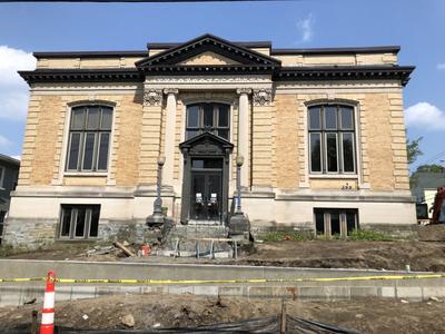 Front view of Library building with new retaining wall in front.