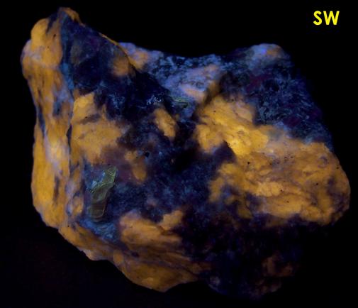 fluorescent Marialite-Meionite Scapolite Wernerite, Muscovite, Pyrite, Limonite, Grenville Scapolite Prospect, Grenville-sur-la-Rouge, Argenteuil RCM, Laurentides, Quebec, Canada