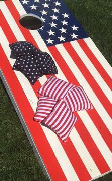 How to easily make a Patriotic themed Red, White and Blue Corn Hole "Bags" Yard game board. FREE step by step instructions www.DIYeasycrafts.com