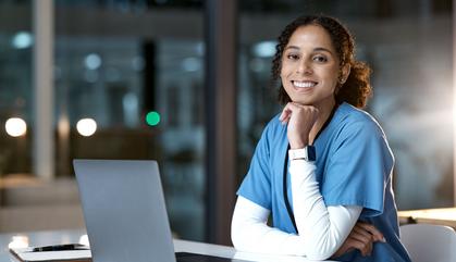 Medical Assistant Working at Desk