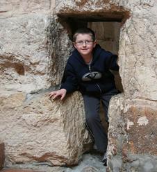 squeezing through a stone needle gate