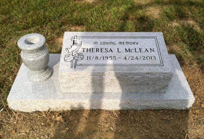 bevel headstone with a vase