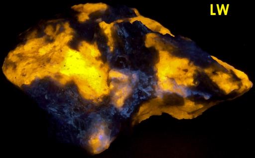 fluorescent Marialite-Meionite Scapolite Wernerite, Muscovite, Pyrite, Limonite, Grenville Scapolite Prospect, Grenville-sur-la-Rouge, Argenteuil RCM, Laurentides, Quebec, Canada