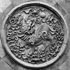 Traditional Tai CHi's dragon medallion.