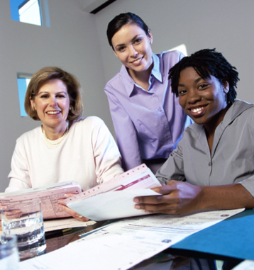 Picture of Financial Planning & Analysis workers discussing services offered by Zautcke CPA including Budgeting & Forecasting and Financial Planning & Analysis in Ft. Myers Florida