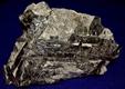 ANNITE with fluorescent SODALITE - Poudrette quarry, Mont Saint Hilaire, Quebec, Canada