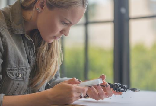 woman holding product design engineering stock