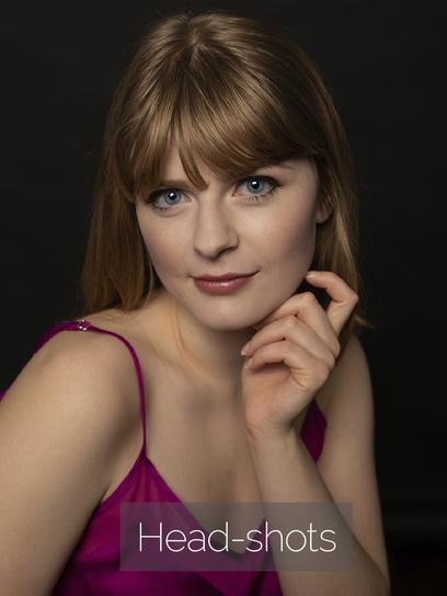 headshot of pretty girl with blue eyes