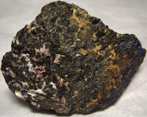 AZURITE, RHODONITE, FRANKLINITE MAGNETITE, fluorescing CALCITE - Sterling Mine, Sterling Hill, Franklin Mining District, Sussex County, New Jersey, USA