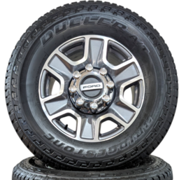 FORD 8 LUG 18" F-250 / F-350 BRIGHT MACHINED AND CARBONIZED GRAY WHEELS WITH BRIDGESTONE DUELER A/T