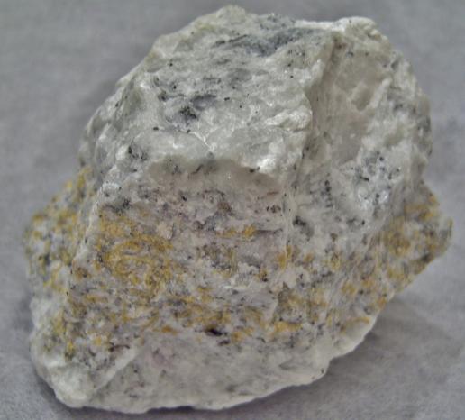 fluorescing NORBERGITE, FLUOROPHLOGOPITE, GRAPHITE, CALCITE - Franklin Quarry (Braens Quarry; Moses Bigelow Quarry; Farber Quarry), Franklin Marble, Franklin, Franklin Mining District, Sussex County, New Jersey, USA