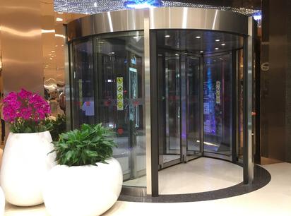 two wings electric revolving glass door