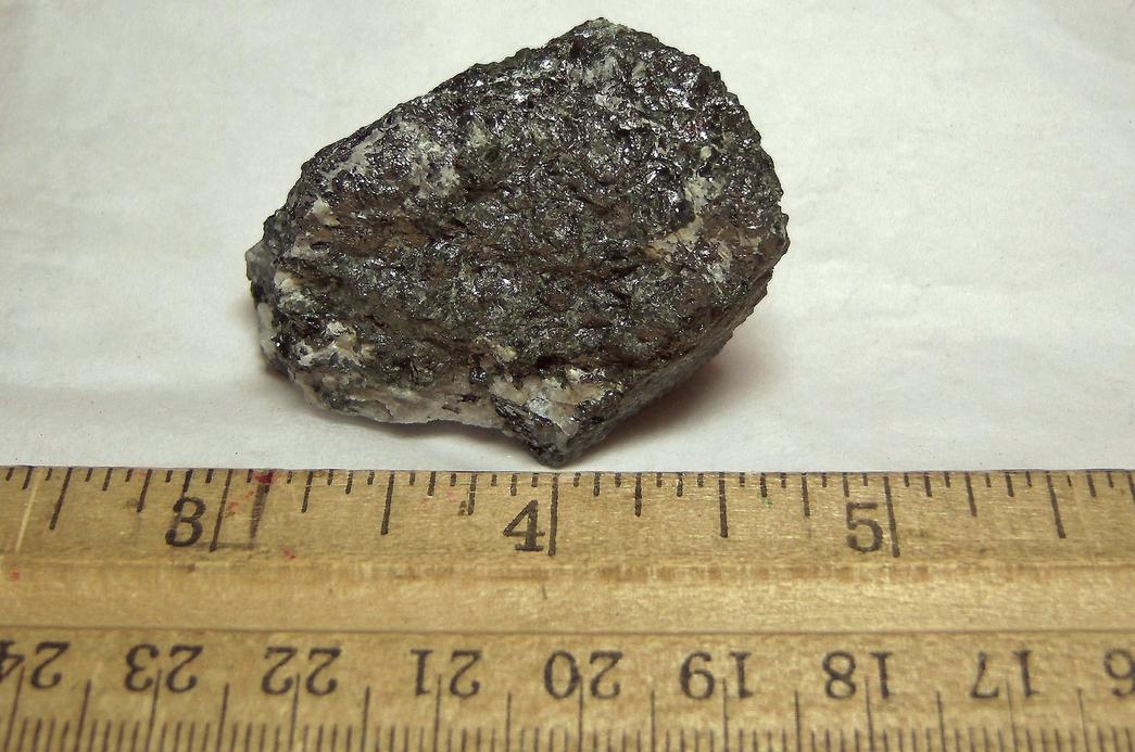 Graphite, fluorescent Meionite Scapolite, green pyroxene - Lead Hill Mines (Chilson Hill mine), Ticonderoga, Ticonderoga Township, Essex County, New York, USA