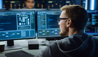 IT specialist working at workstation