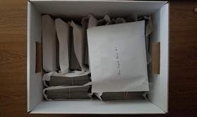 large-collection-photos-organized-in-envelopes