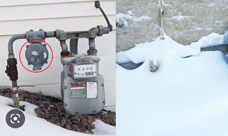 <img alt="Picture of gas meter and a vent covered in snow" src="...">