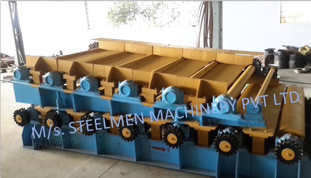 Y-TABLE FOR ROLLING MILLS, OIL LUBRICATION SYSTEM (Capacity - 50 LPM to 300 LPM), AUTOMATIC BUNDLING MACHINE, Hot Billet Shear, Billet Charging Grate, Flywheel, Gear Boxes, Mill Stands, Shearing Machines, Conveyor Rolls, Spindle Carrier, Pinch Rolls, Tilting Tables, Twin Channel, TMT Quenching System, Tail Breaker Pinch Rolls, Oil Lubrication System, Guide Box & Twist Pipes Mechanical Pusher, Mill Accessories, TMT Chain Transfer System, Recuperators, Cooling Tower, gear coupling, universal spindles, steel rolling mill, rolling mill items, steel plant machineries, steel plants, CCM, Continuous casting machine, steel melting, steel makers, leju Thomas, 9310524787, Gear boxes, Pinion stands, Rolling mill Stands on Fiber& bearings, Roller tables, Tilting tables, Y tables, Guide boxes, Chocks, Couplings, Spindles, Rotary shears, Flying shears, Cantilever type pinch Rolls, Tail Breaker pinch Rolls, Quenching Systems (for 8-16 mm, 16-25 mm, & 25-32 mm), Twin channel, Hot Rolling Mills, Shears, Automatic Cooling Bed, Quenching Boxes, Twin Channel Machine, Mill Stands, Cold Rolling Mills, Gear Couplings, Industrial Gear Box, Punching Cropping Machine, Hot Saw, Transmission Tower Machinery, Chain Transfer Systems, Product Design Development, Hot Rolling Mills Bar Rolling Mill Hot Rolling Mill Equipment Slit Rolling Mill Shears Flying Shear Crank Shear Continuous Rotating Shear Disc & Drum Shear Automatic Cooling Bed Quenching Boxes TMT Quenching Boxes Twin Channel Machine Industrial Gear Box Helical Gear Box Rolling Mill Gear Boxes Mill Stands Rolling Mill Stands TMT Mill Stands Housingless Mill Stands Cold Rolling Mills Gear Couplings Gear Jobwork Punching Cropping Machine Hot Saw Traveling type Hot Saw Fixed type Hot Saw Transmission Tower Machinery Chain Transfer Systems Product Design Development, Turnkey Solutions For Hot Rolling Mills Coilers Mill stands Shears & hot saws Twin channel Cooling beds Gear boxes & pinion stands TMT Equipment, Rolling Mill Machines Blade Grinding Machine Hot Saw Machines Straightening Machine Hydraulic Pusher, Hydraulic Cylinders, Ejectors, Hot Rolling Mill Flywheels Gear Boxes Mill Stands Gear Couplings Material Handling Equipment TMT Equipment Cooling Bed Shearing Machines Straightening Machines Spare Parts Of Rolling Mills Other Allied Equipments Bending & Time Machine Workshop Machinery, ♦ Bar Mills ♦ Structural Steel Mill Wire Rod Mill with Bar in Coil Line Rolling Mill for High-Grade Steels Section Mill High Speed Laying Head with Gear Box Crank Lever Shears Crank Shears Housingless Stands Double Crank Shears Rake Type Cooling Conventional Mill Stands Gear Boxes Rod mill block Varioblock Flying Shear • Tail Braking Pinch Roll • Cold Shear, Starting Stock Billets 160 x 160 x 12,000 mm 130 x 130 x 12,000 mm Furnace Group Charging grate, Hot charging, Elevator, Induction online heater Finished product Rebar 8 three-strand slit TMT Rebar 10 two-strand slit TMT Rebar 12-40 mm TMT Flats, angles and channels are possible too Sub-bundles 100-400 kg Master bundles 1 MT-3 MT Furnace Capacity 80 MT/h Main train Single-strand H/V arrangement, two strands are H/V type Roughing train : 4 off Model 600, 2 off Model 440, Free outlet after stand # 2 Intermediate train : 4 off Model 440, 4 off Model 340 Finishing train : 6 x Model 340 Associated shears Loopers : 8 off vertical, 6 off Single strand, 2 off multi strand Capacity 400,000 MT/y Cooling bed group Water quenching line, Thermex Cooling bed shear Cooling bed 66 x 10 m Finished speed 16 m/s (20 m/s) Material grades Carbon steels, Alloyed Structural Steel grades Continuous finishing shop Stationary cold shear 3,000 kN Counting system Small bundle forming 4 off Tying machine Various associated equipment, e.g. stoppers, chain transfers, roller tables, Starting stock Blooms 180 x 180 x 8,000 - 12,000 mm 300 x 300 x 8,000 - 12,000 mm Finished product Rebars 28 - 40 mm Rounds 30 - 100 mm dia. Hexagons 50 - 80 mm Flats 8 x 30 - 60 x 150 H-Beams 100 - 180 mm I-Beams 100 - 200 mm T-sections 75 - 140 mm Channels 100 - 200 mm Angles 80 x 80 x - 200 x 200 mm U-type sections for mine timbering 18U, 25U,29U Bundle/stack length 6 - 24 m Bundle/stack weight 2 - 5 t Furnace capacity 116/143 t/h Annual capacity 700,000 t/y Finishing speeds 6 m/s Material grades Carbon steels, Alloyed structural steel,Antifriction bearing steel Furnace group: Elevator (for hot charging), charging grate,weighscale, descaler, insulated holding tunnel Mill train: Single strand Roughing train 4 x Model 670, 1 x Model 760(V-H-HV-H) Intermediate train: 2 x Model 760, 4 x Model 670(H-H-H-UR-UR-HV) Finishing train: 5 x Model 670 (UR-HV-UR-HV-FUR) Associated shears Loopers: 4 x vertical Cooling bed group: Water cooling line, pinch roll unit Cooling bed shear Cooling bed 84 x 19 m Short-bar collecting device Continuous finishing shop In-line straightening machine (10 rollers) Hot saws: 1 x stationary, 1 x movable Abrasive cutting machines: 1 x fixed, 1 x movable Piling and stacking facilities (magnet-type) Tying machines: 2 x stationary, 2 x movable Various associated equipment, e.g. stoppers, chain transfers, roller tables. upto 150 x 150 x 12,000 mm Finished product: Wire rod 5.5 - 16 mm Rebars Nos. 3, 4 and 5 (as per ASTM) Coils 16 - 42 mm dia. Furnace capacity: 70 t/h Annual capacity: 300,000 t/y Finishing speeds: Wire rod line - 100 (120) m/s Bar in coil line - 13.5 m/s Material grades: Cold-heading steels Reinforcing steels Steels with a carbon content from low to medium Piano-wire PC-wire Free-cutting steel Water cooling line, pinch roll units, bar reels (2x), coil transfer,chain conveyor with retarded and accelerated cooling facilities, transfer unit to Power & Free coil handling system, Starting stock Billets 50 x 100 x 10,000 mm 125 x 125 x 11,400 mm Finished product Rod 5.5 - 13.5 mm dia. Bars 11 - 57 mm dia. Flads 22 - 120 mm, 5 - 12 mm thick Bundle/stack length 3 - 8.5 m Bundle/stack weight 0.5 - 3 (5) t Furnace capacity up to 60 t/h Material grades High-grade structural steels 34 Cr 4, 60 SiMn7, 42 CrMo4 Antifriction bearing steels 100 Cr 6, 100 Cr 2, 100 CrMo 7 3 Material grades Tool steels X 210 Cr 12, X 38 CrMoV 5 1, 55 CrNiMoVS 4 2 4 Acid-resistant and heat-resistant steels X 5 CrNiMo 18 11, X 2 CrNiMo 19 13,X 20 CrNiSi 25 4 High-speed steels X 79 Wco 18 5, X 82 W Mo 6 5 5 Special alloys X 55 CrMnNiN 20 8,X 45 CrSi 9 3 X 3 CrNiMoNbN 23 17 The complete range of steel grades includes approx. 300 different grades Furnace group: Charging grate, cross transfers, weighscale, descaler (2x), heatholding tunnel Mill train: Single strand, H/V - arrangement Roughing train: PSW and 6 x Model 440 Intermediate train: 4 x Model 440, 2 x Model 340 Finishing train: 4 x Model 340 Kocks-block 8-stand wire rod block for high grade steels 3 x 215/ 5 x 170 Associated shears Loopers: 7 x vertical, 1 x horizontal Cooling bed group: Water cooling line, pinch roll unit Cooling bed shear Cooling bed 57 x 5 m Continuous finishing shop: Abrasive cutting machine Piling and stacking facilities (non-magnet type) Tying machines: 1 x fi xed, 1 x movable various associated equipment, e.g. stoppers, chain transfers, roller tables etc. Rod finishing equipment: Water cooling and equalizing sections, pinch roll unit,laying head Ring conveyor for retarded and accelerated cooling reforming tub Pallet-type coil handling system, compacting & tying units,weighscale, unloading station Reel plant Water cooling and equalizing sections, Pinch roll units, Bar reels: 2 x, Transfer equipment to pallet-type coil handling system, Omsairam Steel & Alloys Pvt. Ltd., Bhagyalaxml Rolling Mills Pvt. Ltd., Kalika Re-rollers Pvt. Ltd., Parvati Alloys (P) Ltd., MITC Rolling Mills (P) Ltd., Maharashtra Steel Rolling & Engg Co. Chimanlal Vijay Kumar Steels Pvt. Ltd, Bhagwati Ferro Metals (P) Ltd, Balbir Rolling Mills Ltd. Quartz Metals Inds., Metro Alloys Ltd., Pushpak Steel Inds. Pvt Ltd., T. k. Ispat Pvt Ltd., Allied Ferromelt Pvt Ltd., Bhagwati Steel Cast Ltd., R. L. Steels Ltd., Guardian Steels Pvt. Ltd., Shri Karvir Nivasini Mahalakshmi Ispat Pvt. Ltd., Khatu Shyamji Steel Rolling Mills Pvt. Ltd., Kunal Ispat & Alloy Inds. Pvt Ltd. Sun Metallics & Alloys Pvt. Ltd, Hans Ispat Ltd. Shri Khatu Shyam Industries, Rajuri Steel Pvt. Ltd, Shree Om Steel Rolling, Air Carrying Corpn (I) Ltd., titan Alloys Ltd. Sunflag Iron & Steel Co. Ltd., Sharda Ispat Ltd., Fortune Metaliks Ltd., Sharda Shree Ispat Ltd., R. K. Structures Pvt. Ltd., Sanvijay Industries Pvt. Ltd., Shivali Udyog (I) Ltd., S.D. Bansal Iron & Steel Pvt. Ltd., Inertia Iron & Steel Inds. Pvt. Ltd., Nalwa Steel & Power Ltd., Shilpa Re-rollers Ltd., Sri Jai Balaj Steel Rolling Mills Ltd., Petropol India Ltd. Galwalia Ispat Udyog Pvt. Ltd. Crest Steel & Power Pvt. Ltd. Himalayan Rolling Steel Industries Pvt. Ltd., Shree Balaji Pigments Pvt. Ltd., Upper India Steel Mfg. & Engg. Co. Ltd., Capital Ispat Ltd., Barnala Steels Inds. Ltd., Shri S.S. Shyam Steels Pvt. Ltd. Fortune Metals Ltd. Rathi Udyog Ltd., M/s. Gallantt Ispat Lyd., Gemini Merchandise Pvt. Ltd., Jagdamba Rolling Mills, Shree Krishna Steel Rolling (Jaipur) Ltd. Modi Steels, Usha Martin Inds. Prince TMT Steels Pvt. Ltd., Dindigul Iron & Steel Co (P) Ltd. ARS Metals Ltd. V.V. Iron & Steel Company Pvt Ltd. Jairaj Ispat Ltd., Pioneer Torsteel Mills (P) Ltd., Devshree Ispat Pvt. Ltd., Vaibhav Merchantile Ltd., Maa Mahamaya Inds. Pvt. Ltd., Chitrakoot Metal Ltd. P. R. Rolling Mills Pvt. Ltd. Shree Aravindh Steels Ltd. Shyam Steel Industries Ltd. Shri Ramrupai Balaji Steels Ltd. Adhunik Ispat Pvt. Ltd. Durgapur Steels Ltd. B. M. A. Stainless Ltd. Zion Steel Ltd. Shree Metaliks Ltd. Usha Martin Ltd. Shyam Sel Ltd. Maithan Steel & Power Ltd.