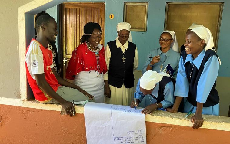 Holy Trinity Sisters and Maryan Ntausian, founder and director of Baringo-based CBO Community Land and Environmental Protection Agency