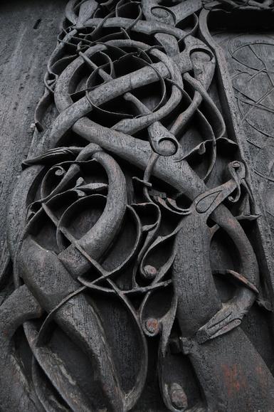 carved wood Hiberno-Urnes decorative panel at Urnes Stave Church. Photography Krevin O'Dwyer