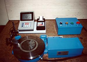 A Rotary Grinding Table Inside and Outside Surface Diameter Inspection unit laid out on a table