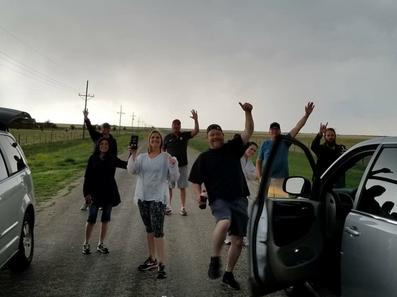 Tornado tour guests happy after seeing a tornado