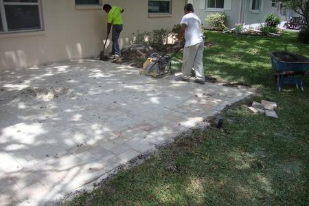 How to Seat Pavers with sand and compactor