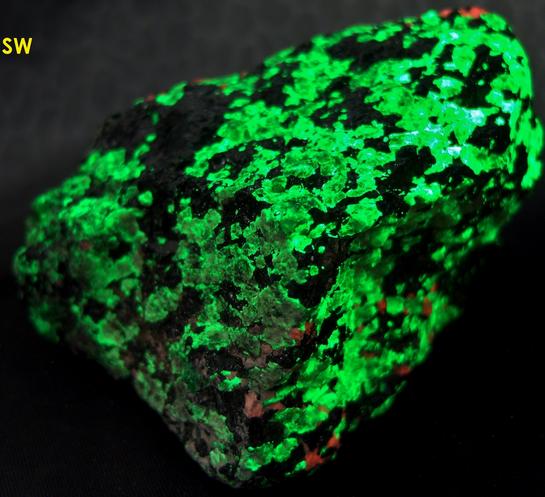 FRANKLINITE, fluorescing WILLEMITE, CALCITE - Sterling Mine, Sterling Hill, Ogdensburg, Franklin Mining District, Sussex County, New Jersey, USA - Franklinite type locality