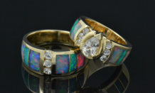 Hileman Australian opal wedding ring set in 14k gold with white sapphires.