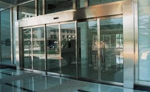 Automatic sliding power door operator