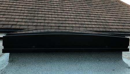VELUX curved glass flat roof. PMV Maintenance - VELUX and Roto roof window / Skylight repair, replacement, installation, re-glazing, servicing, maintenance, Blinds, Leaks, repairs, Glass, renovation specialists covering London, Hertfordshire, Bedfordshire, Cambridgeshire, Essex, South London, North London and Central London.