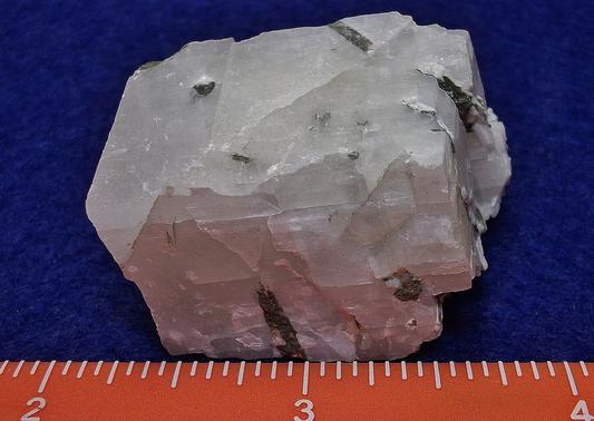 fluorescing CALCITE with LAUMONTITE - Churchville Quarry (Davis Quarry Company Inc.), Churchville, Hardford County, Maryland, USA