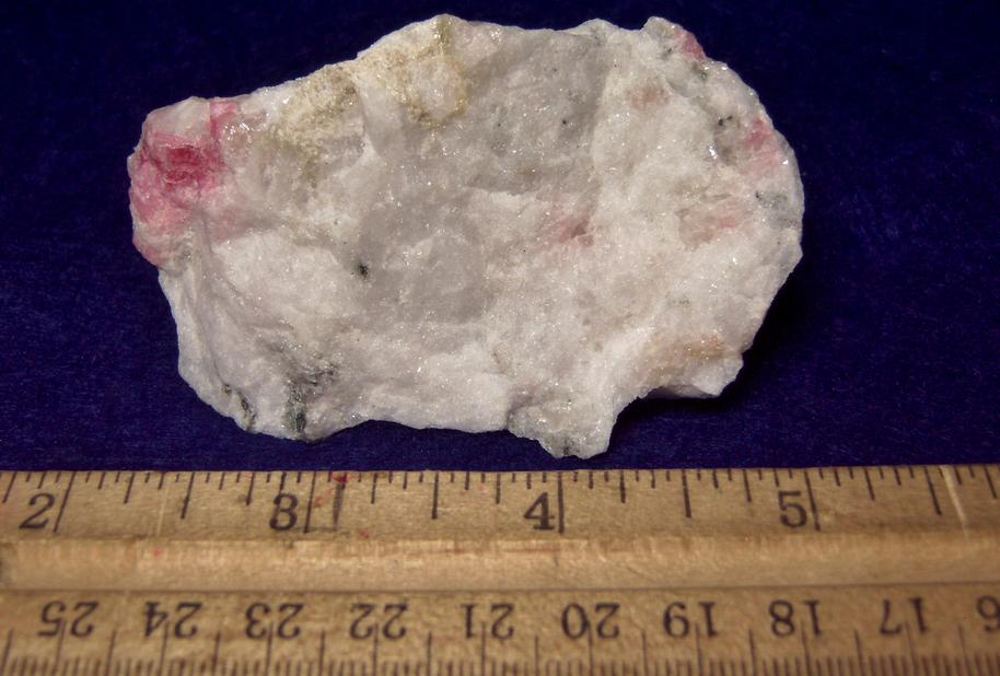 SW LW fluorescent TUGTUPITE, POLYLITHIONITE, AEGIRINE ACMITE - Tasseq Slope - West (Taseq Slopes), Tasseq area, Ilimaussaq complex, Narsaq, Kujalleq (Kitaa Province; West Greenland), Greenland, Denmark