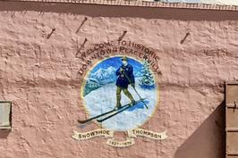 Community Pride Volunteers Mural Project or Snowshoe Thompson by Muralist Oran Miller, Placerville, California. Photo by Josette Johnson