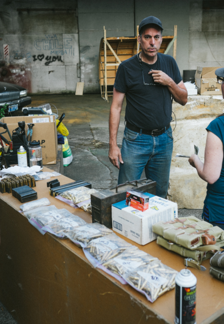Jay Lance preping weapons for a scene