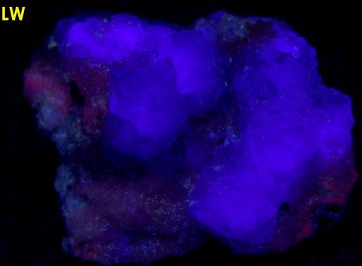 fluorescent FLUORITE on CALCITE with PYRITE, Huanzala Mine, Huallanca District, Bolognesi Province, Ancash Department, Peru