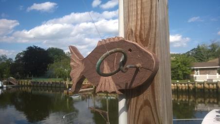 DIY Fence Fish made from recycled Trex. This one is incorporated into a ring on a string game. www.DIYeasycrafts.com