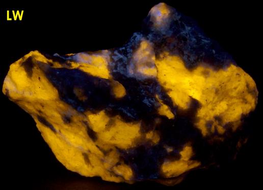 fluorescent Marialite-Meionite Scapolite Wernerite, Muscovite, Pyrite, Limonite, Grenville Scapolite Prospect, Grenville-sur-la-Rouge, Argenteuil RCM, Laurentides, Quebec, Canada