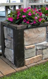 Easy DIY Outdoor and Backyard crafts and projects. Raised Stone Planter. www.DIYeasycrafts.com