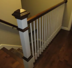 Staircase banister finished painting.