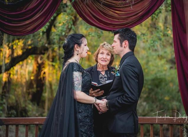 rainy beach wedding. Officiant fun