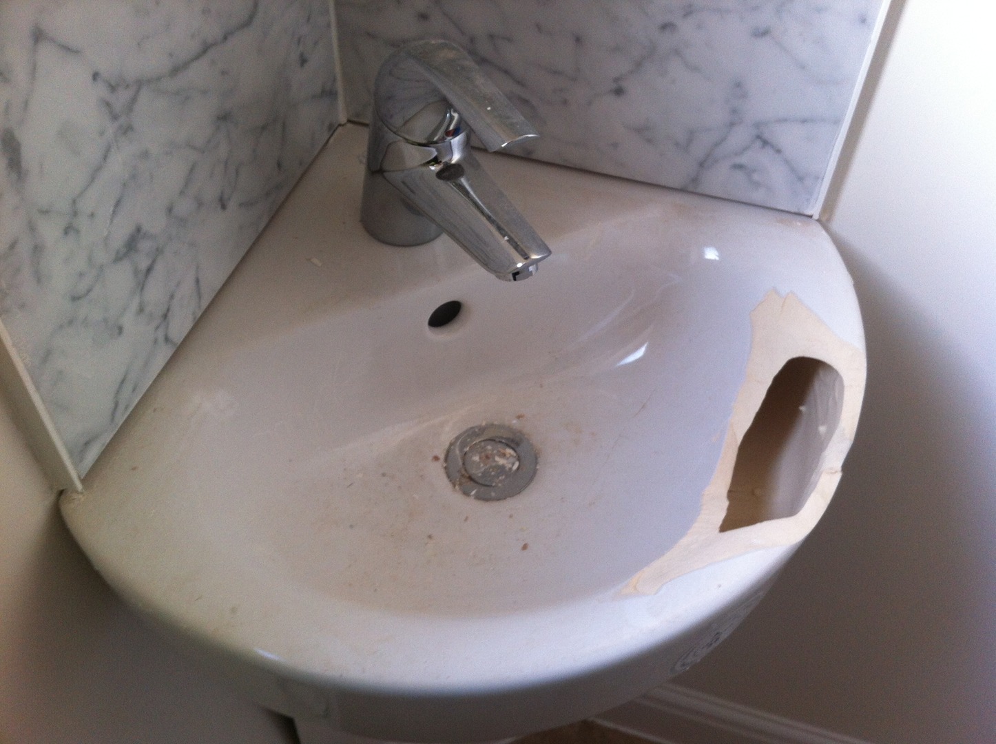 Repairing a store porcelain sink