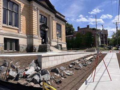 Library building, retaining wall, boulder wall with dirt