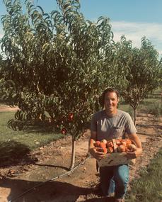 Hank Jr with a Basket of Peaches